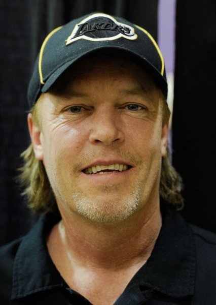 Jim+Buss+wearing+a+black+Laker+hat+in+2011.JPG